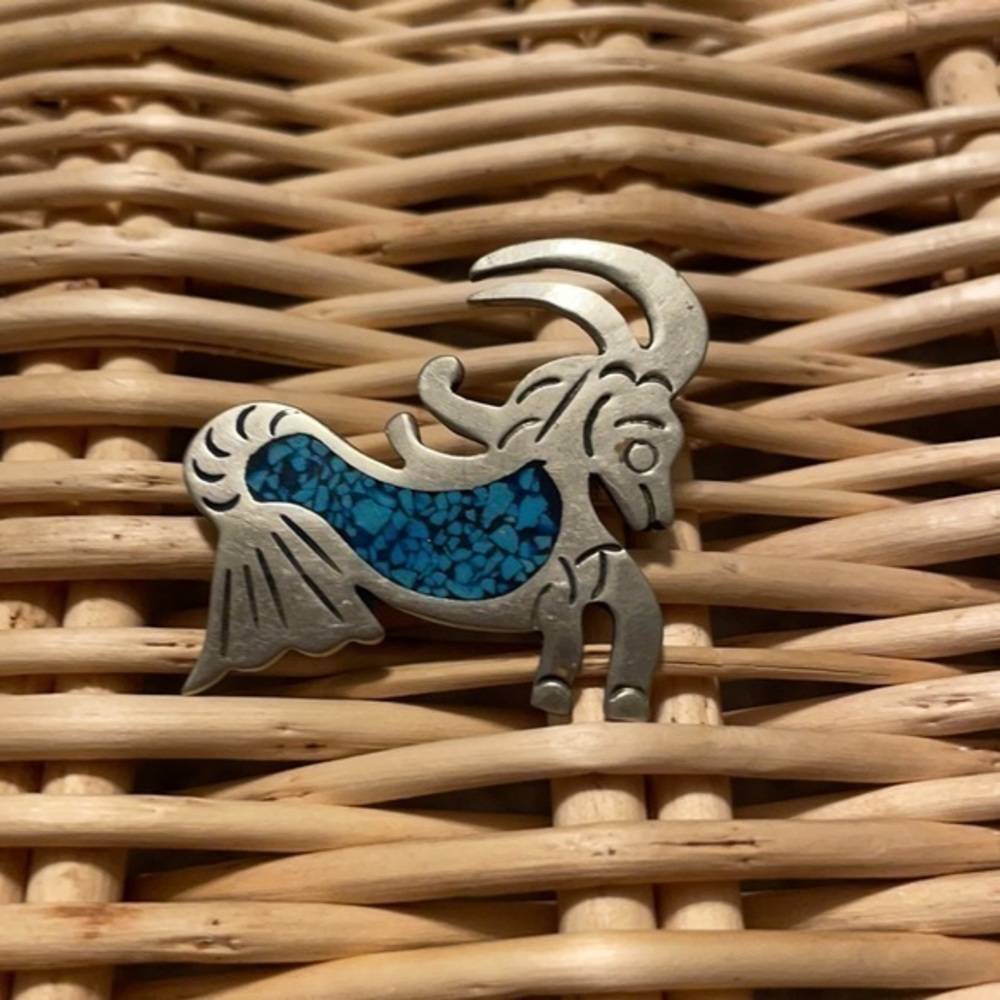 Vintage Silver & crushed turquoise colored broach depicting Capricorn goat fish